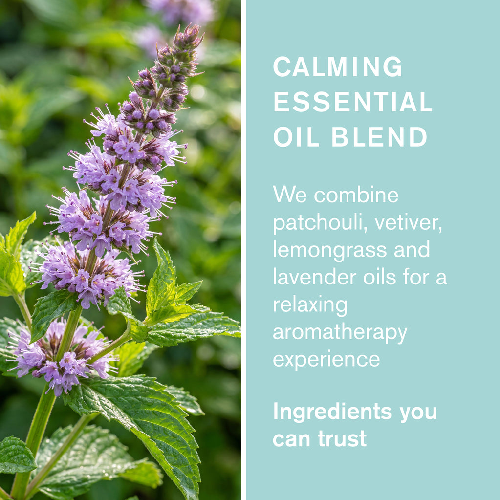 Green People purple flower with text highlighting a calming blend of patchouli, vetiver, lemongrass and lavender oils.