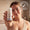 Woman holding Green People Rosemary & Prebiotics Deodorant, with a Dermatologically Tested badge.