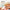 Thumbnail for Happy woman with straw hat on boat, sunlight on hair and face, with text overlay. image
