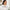 Thumbnail for A woman applies Age Defy+ Collagen Boost Vitamin C Serum 30ml to her cheek in the mirror beside a five-star review overlay. image