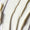 Close-up top-down view of thick, creamy white product spread with several distinct, wavy ridges and smooth sections.