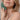 Thumbnail for woman using jade gua sha massage tool